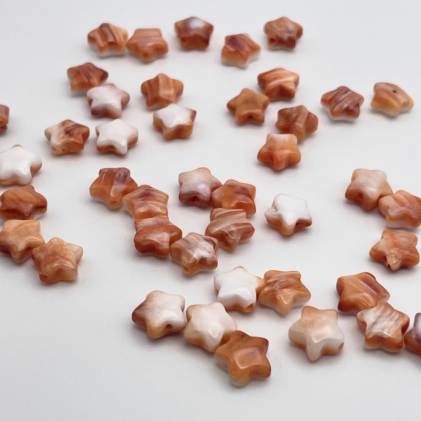 8mm Spiny Oyster Star Smooth Bead Strand.