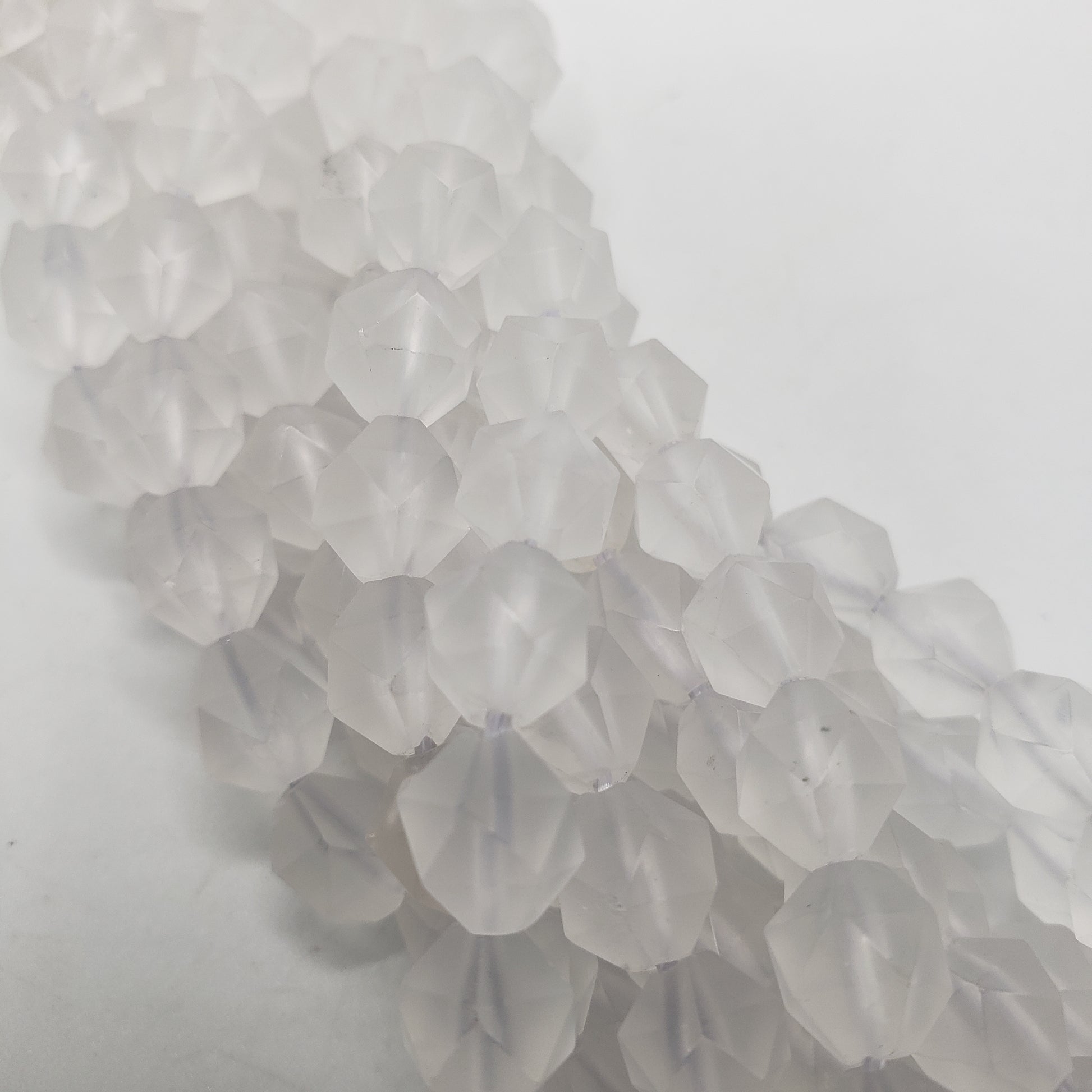 8mm Star Cut Clear Quartz Matte Bead Strand.