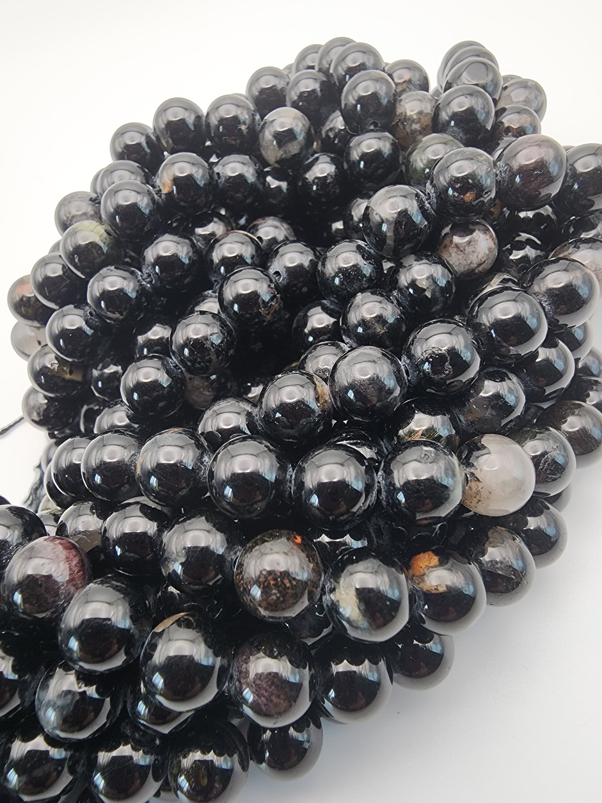 8mm Tourmaline With Quartz Round Bead Strand.