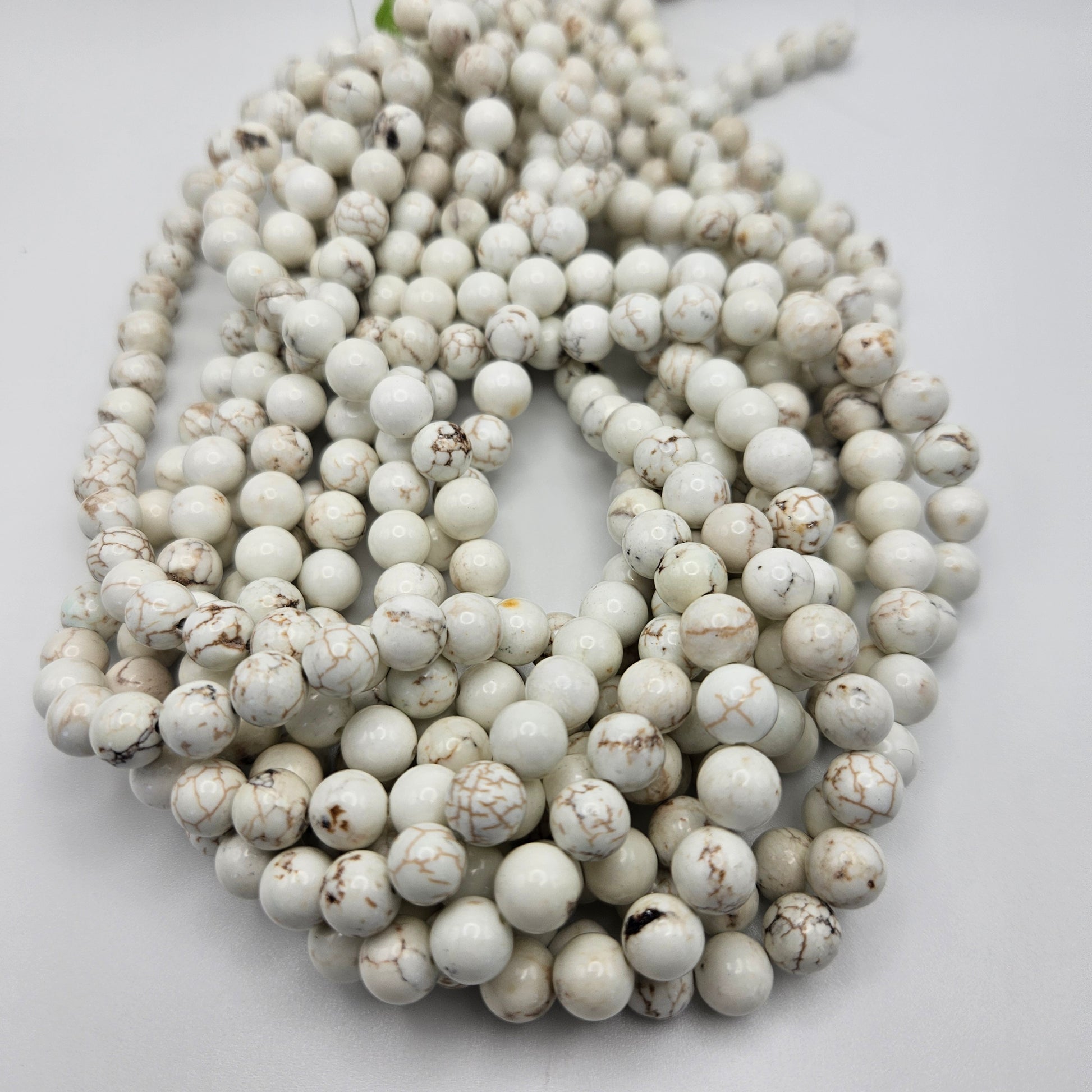 8mm White Buffalo Round Bead Strand.