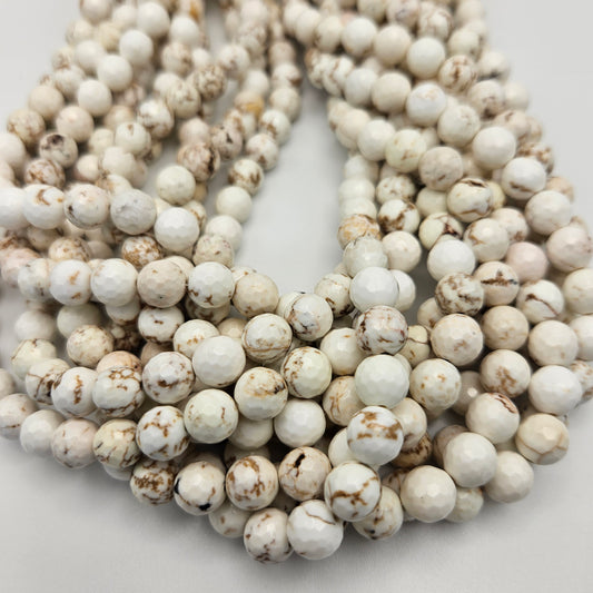 8mm White Buffalo Round Faceted Bead Strand.