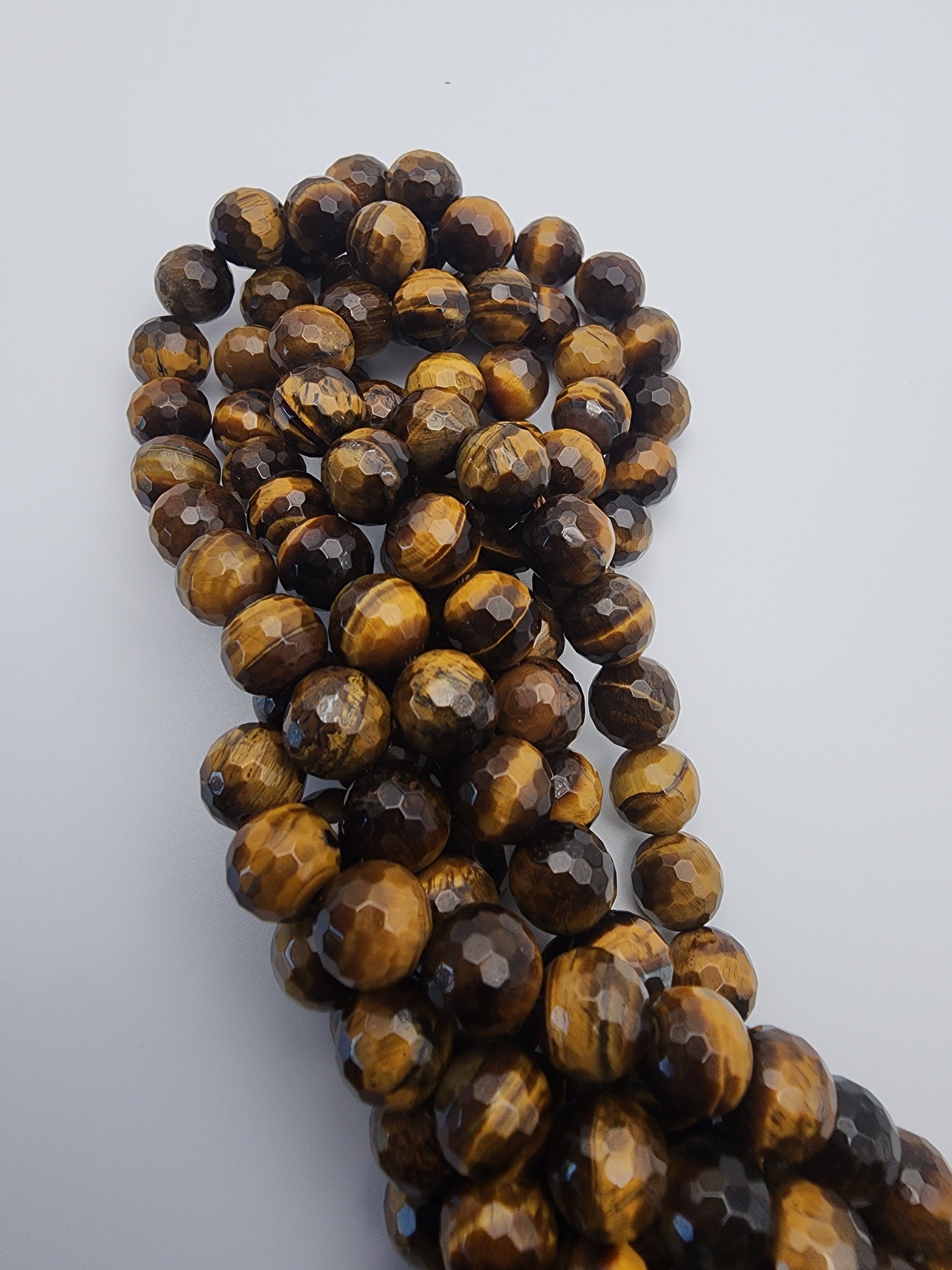 8mm Tiger's Eye Faceted.