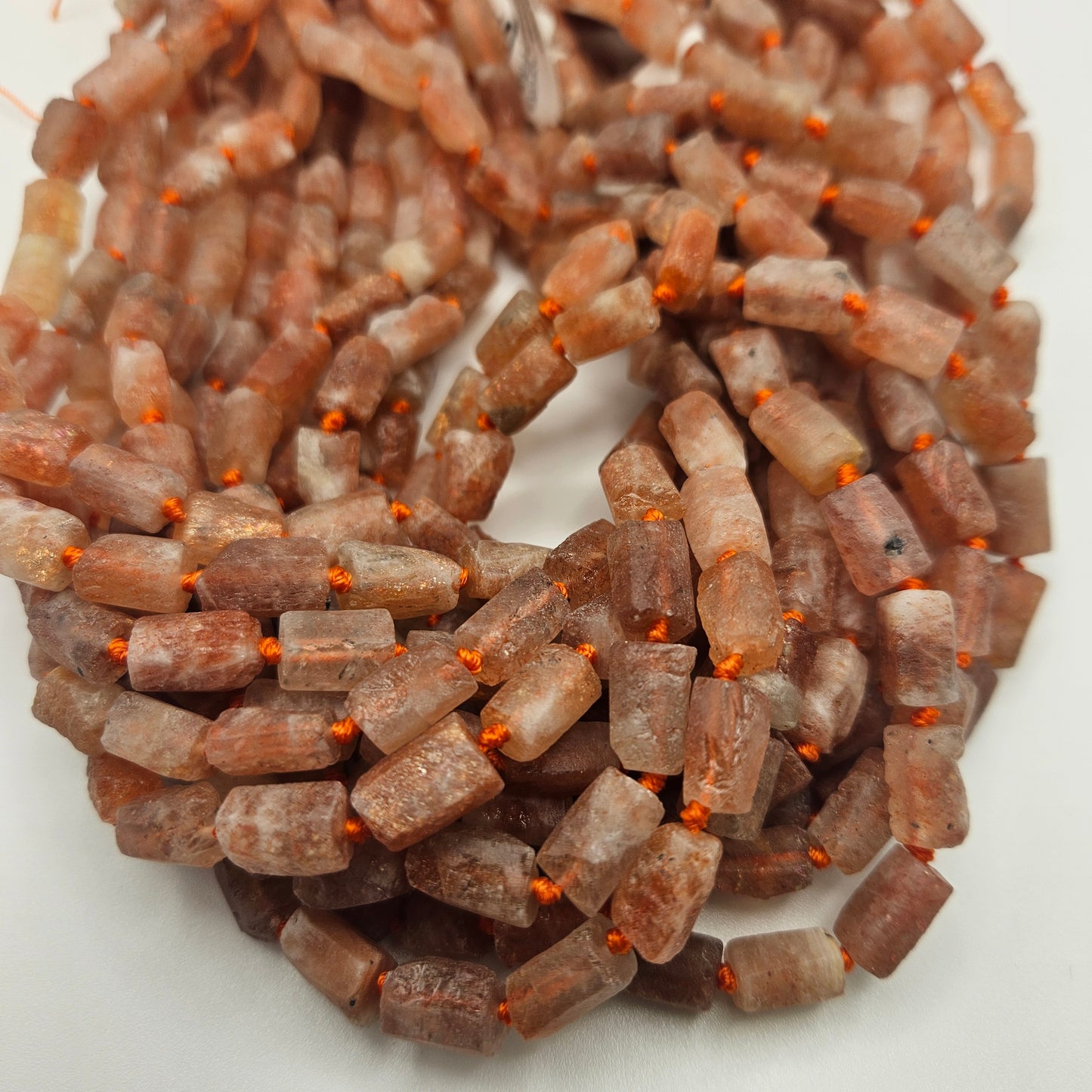 8x12mm Sunstone Rough Tube Bead Strand.