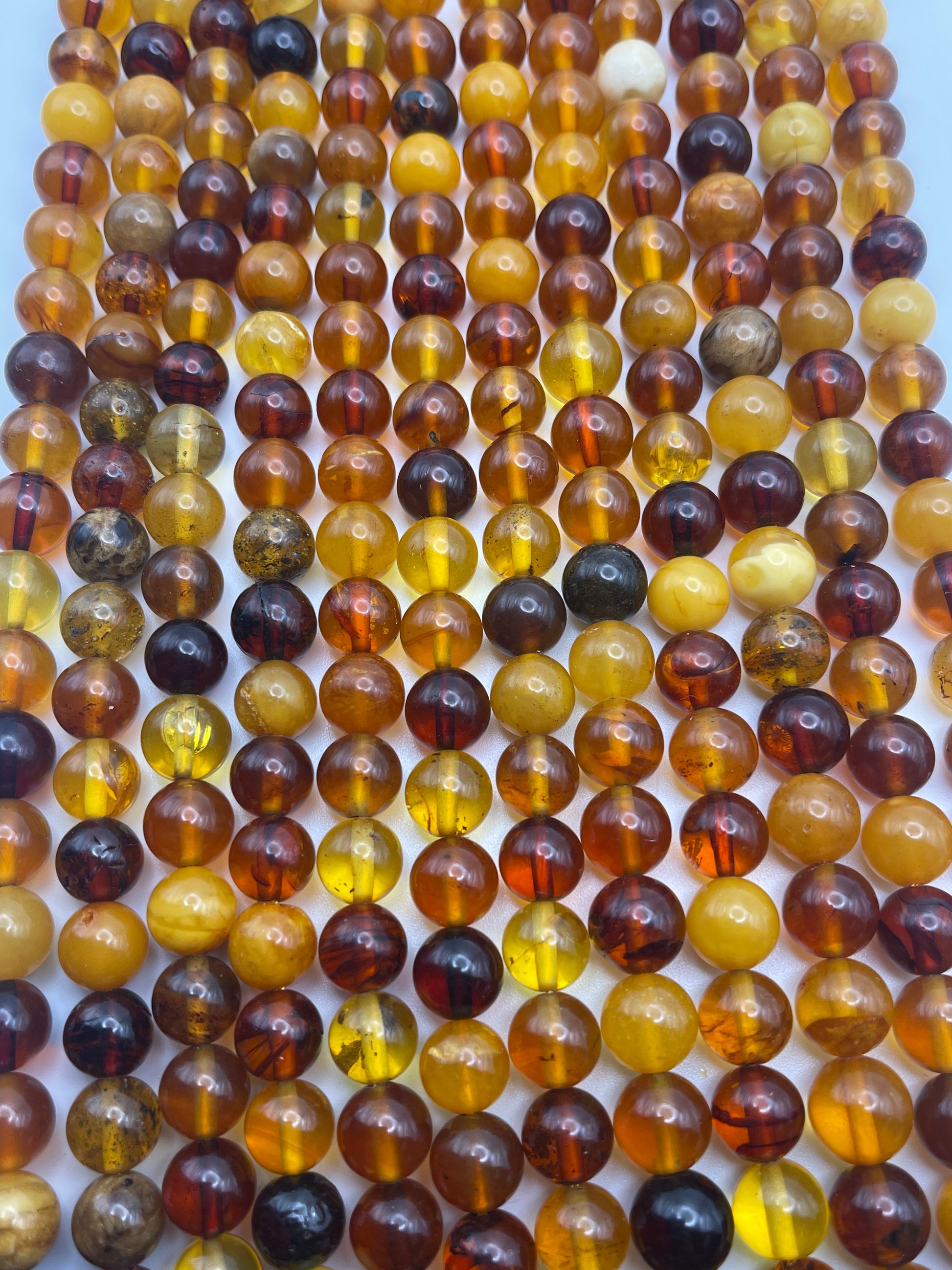 9mm Amber Round Mixed Bead Strand.