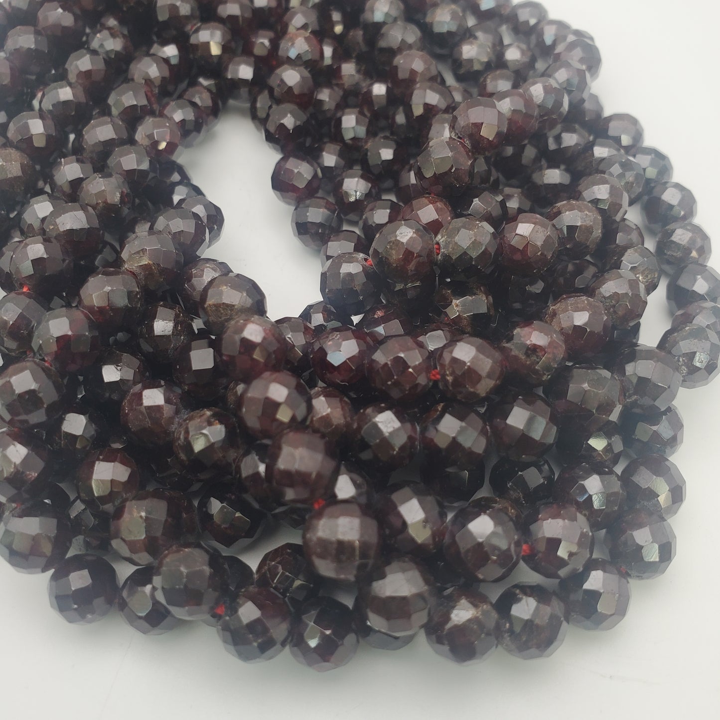 9mm Faceted Round Garnet Bead Strand.
