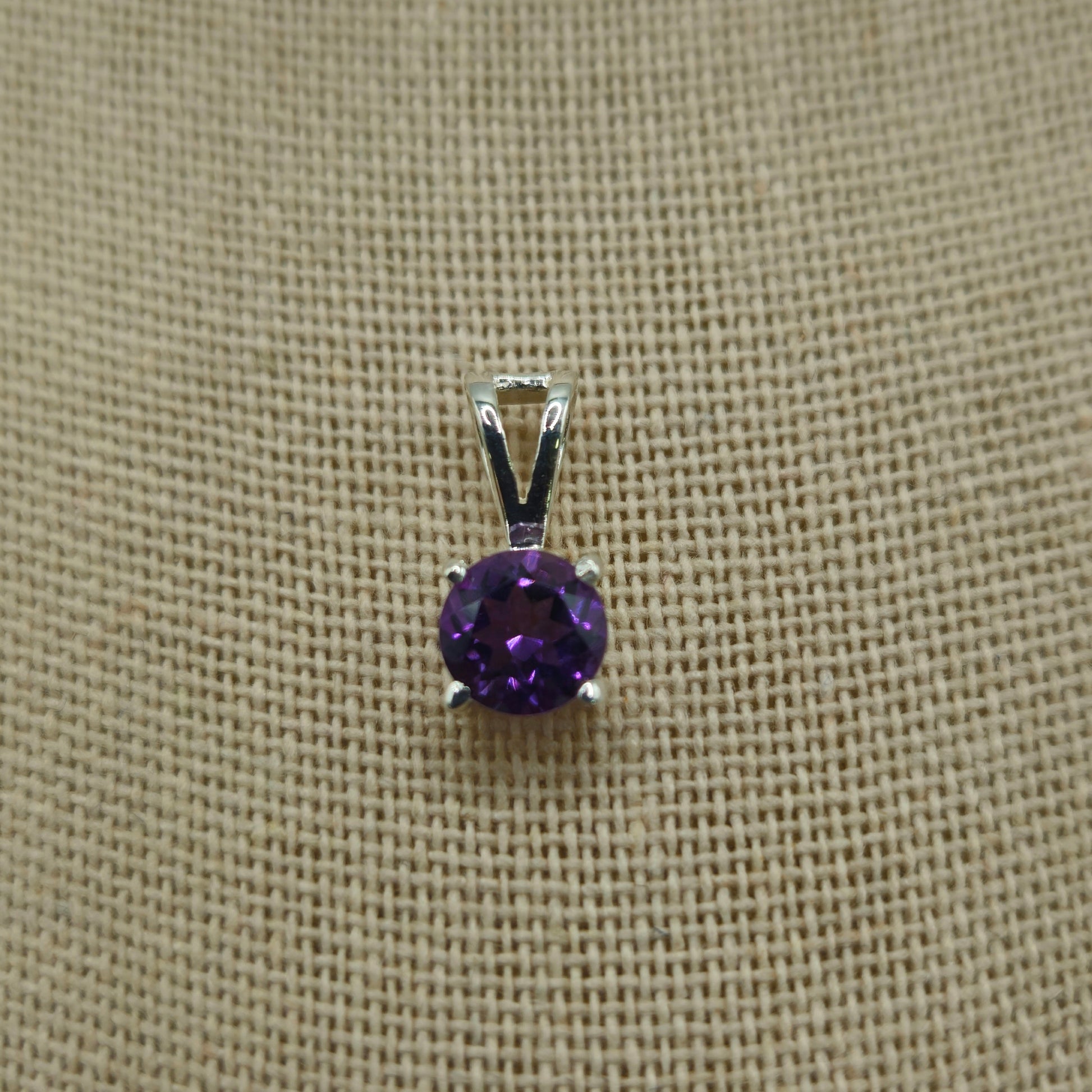 Amethyst Sterling Silver Round Faceted Pendant.