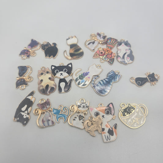 Assorted Cat Charms Gold Colored.