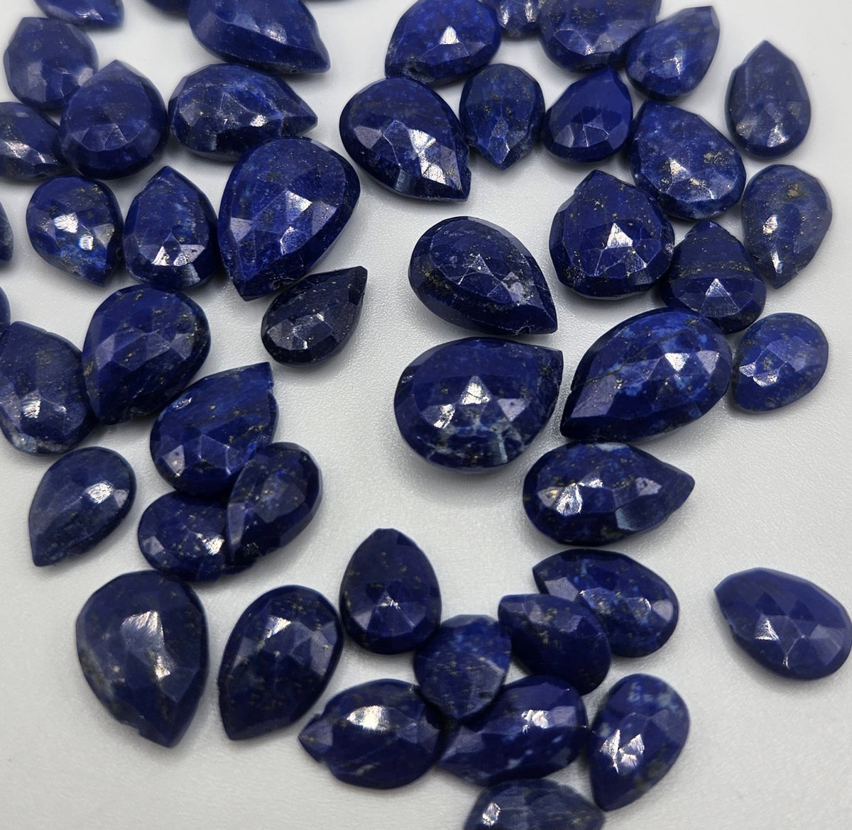Assorted Faceted Lapis Lazuli Top Drill Single Bead.