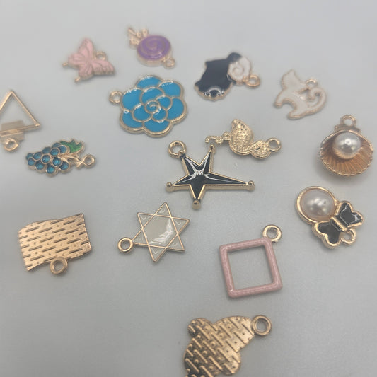 Assorted Fun Charms Gold Colored.