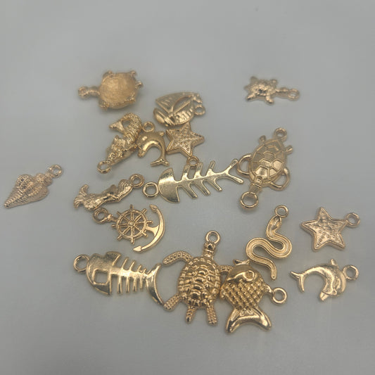 Assorted Fun Charms Gold Colored.