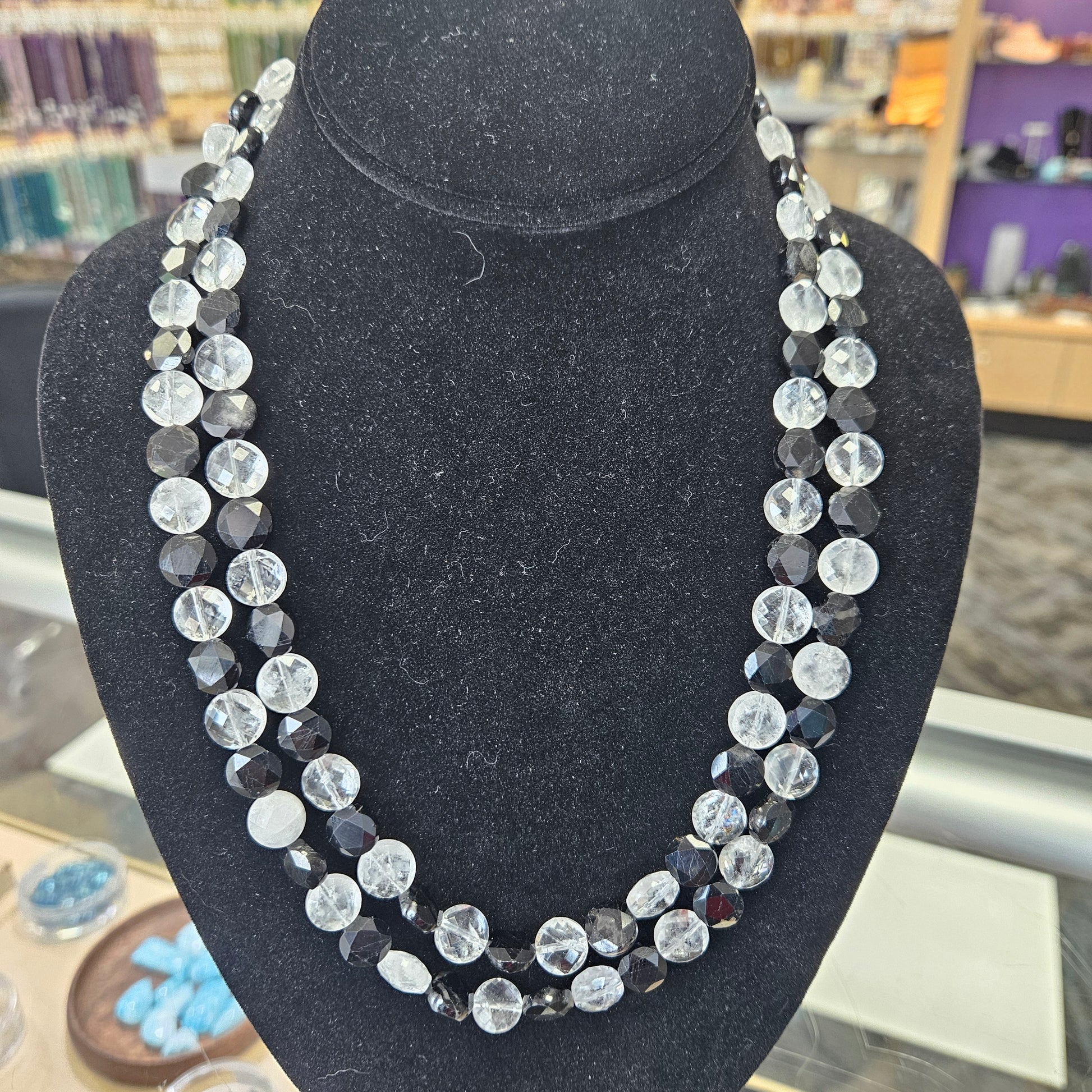 Black Tourmaline and Clear Quartz Multi-Strand Coin Necklace.