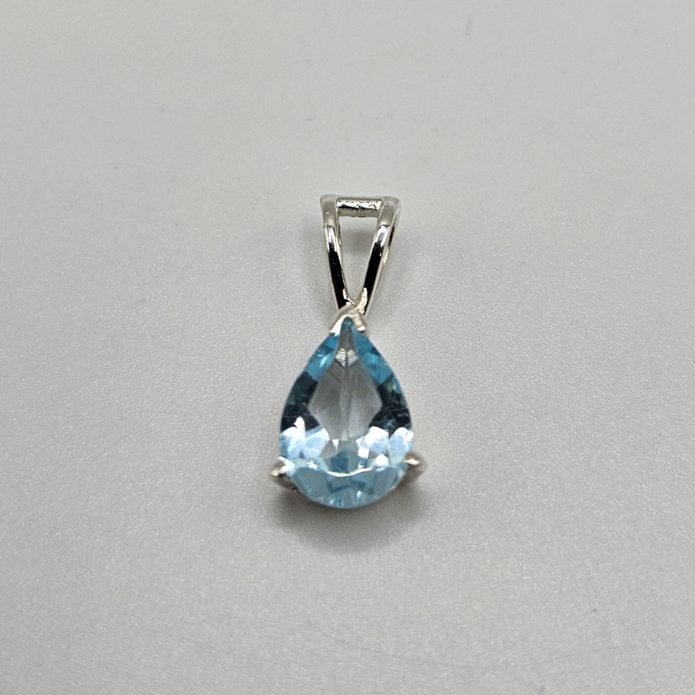 Blue Topaz Sterling Silver Teardrop Faceted Pendant.