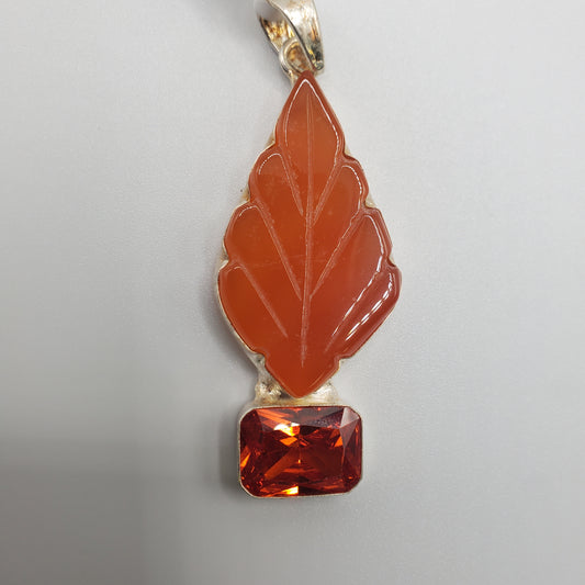 Carved Carnelian with Faceted Gemstone Pendant.