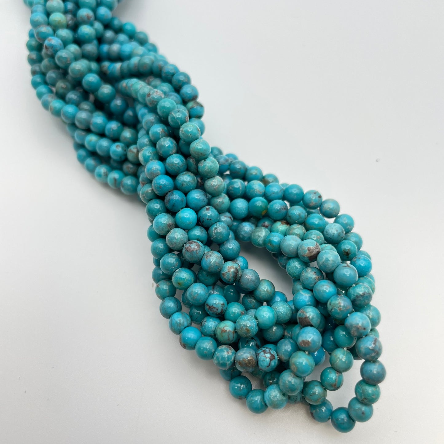 4mm Turquoise Smooth Round Strand