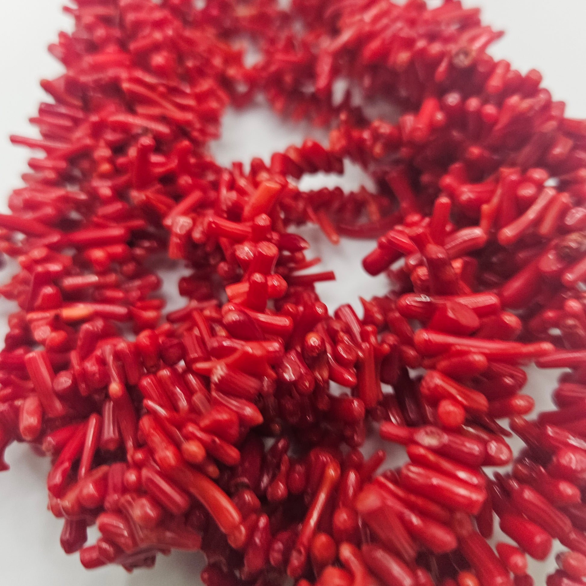 Dyed Red Coral Branch Bead Strand.