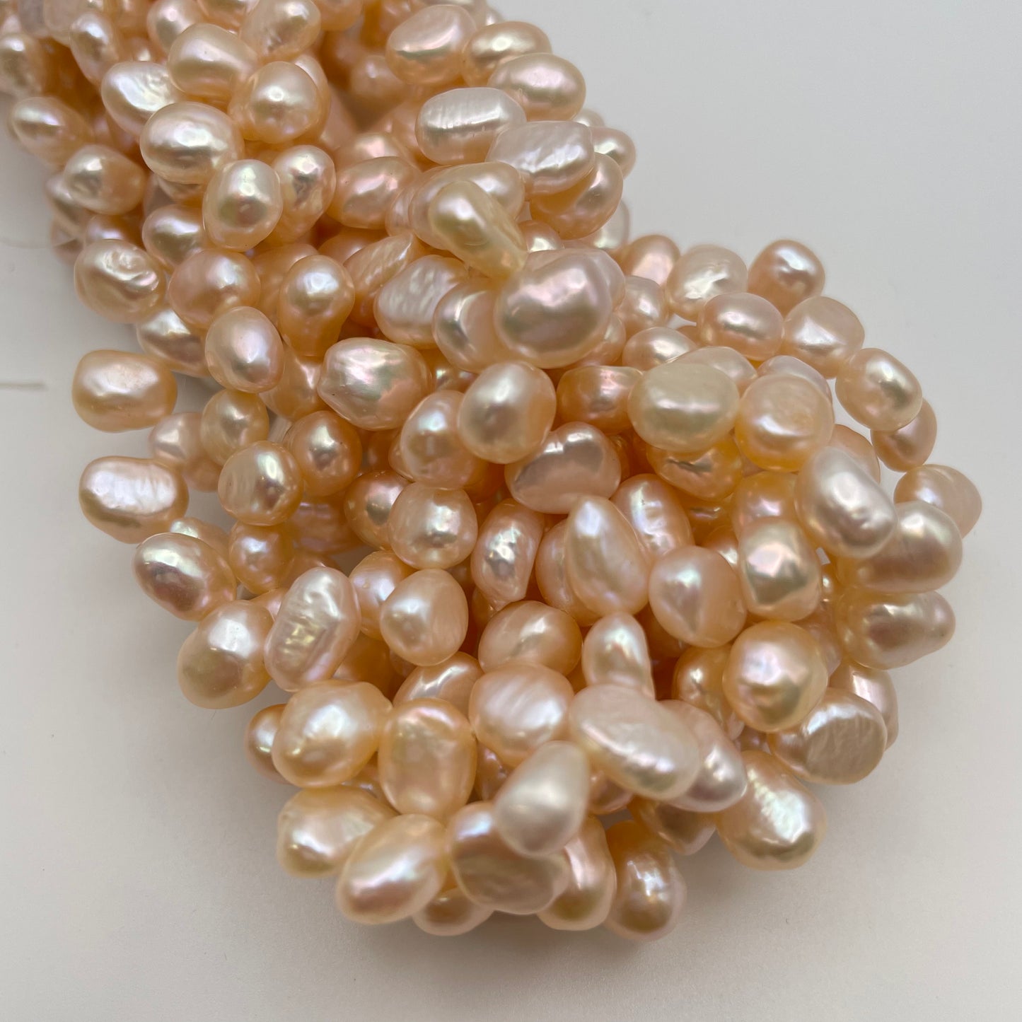 8mm Pink Pearl Dancing Top Drill Strand