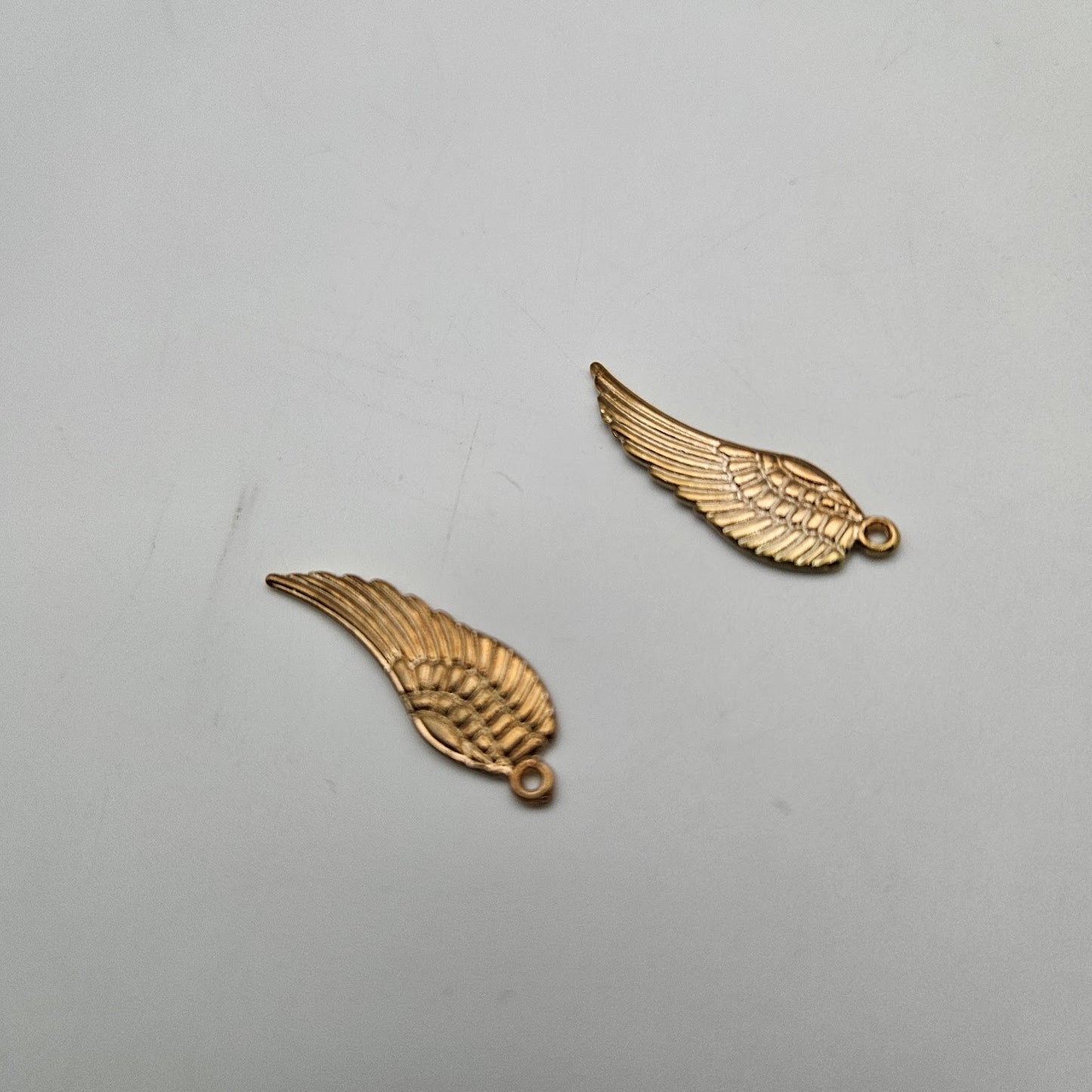 Gold Colored Pewter Angel Wing Charm.