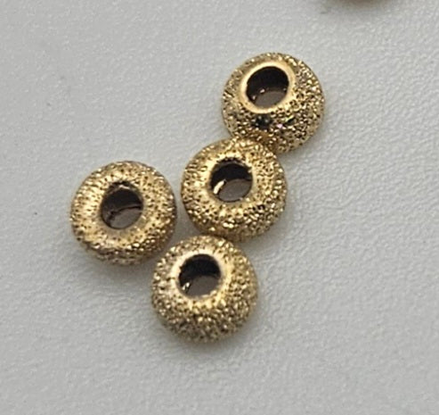 Gold Filled Laser Donut Beads 4mm 10 Pack.