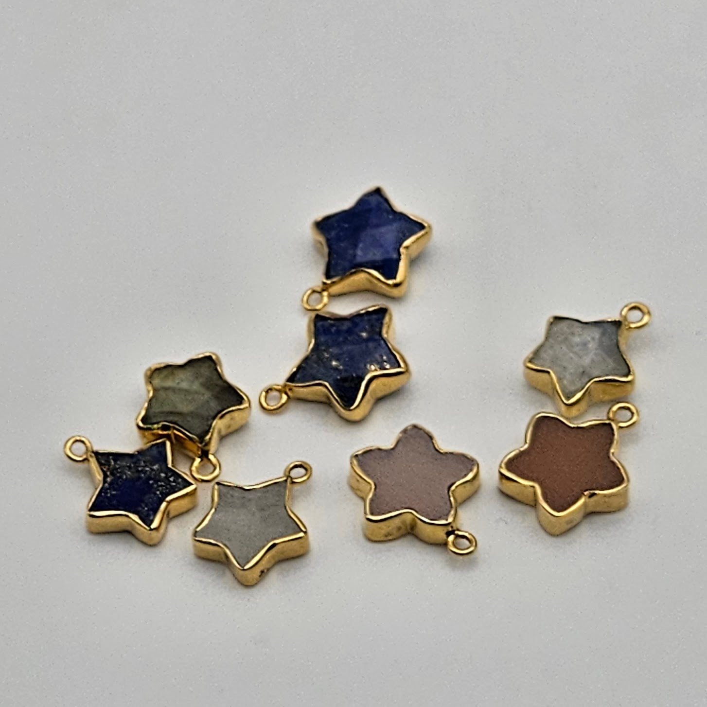 Gold Plated Assorted Star Charm.
