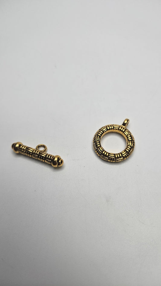 Gold Colored Woven Pewter Clasp.