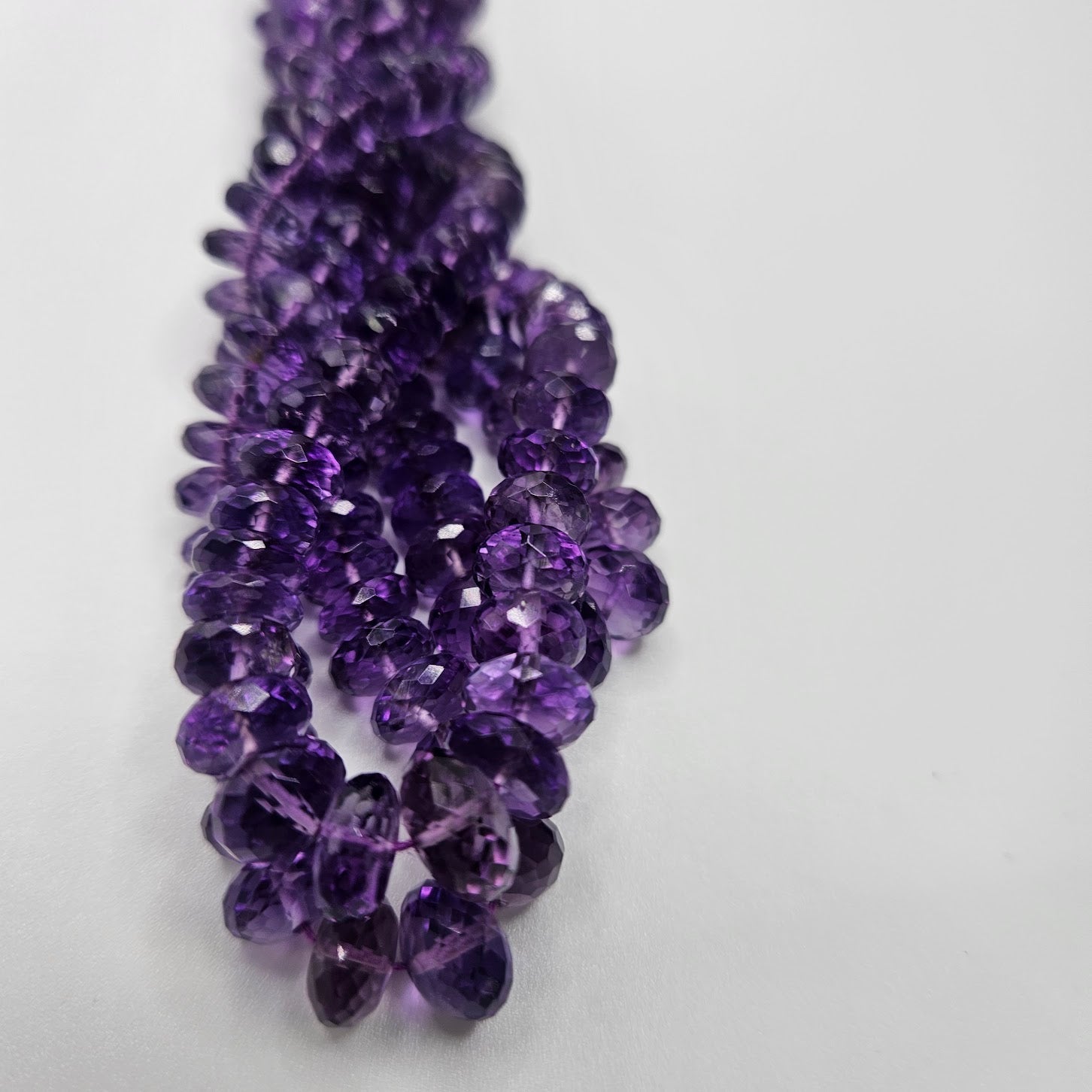 Graduated Amethyst Faceted Strand.