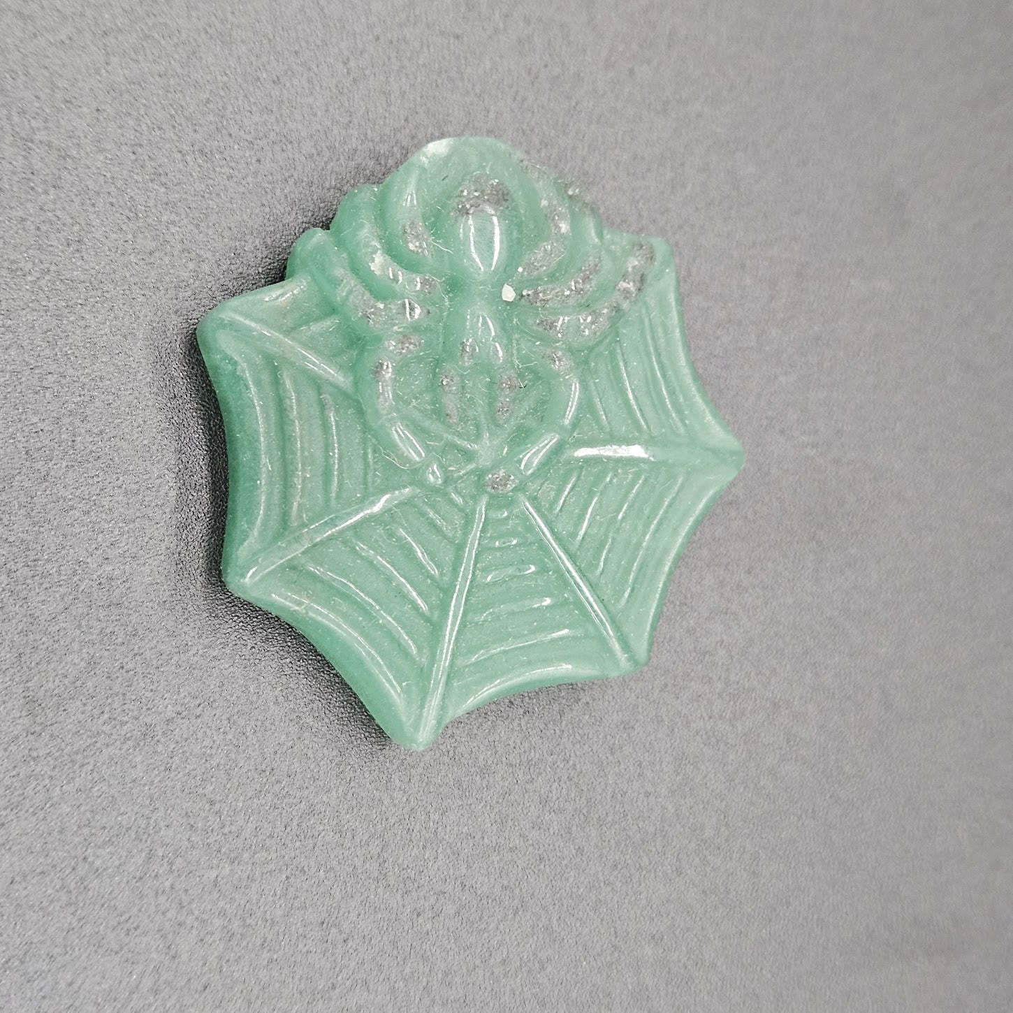Green Aventurine Spider On Web.