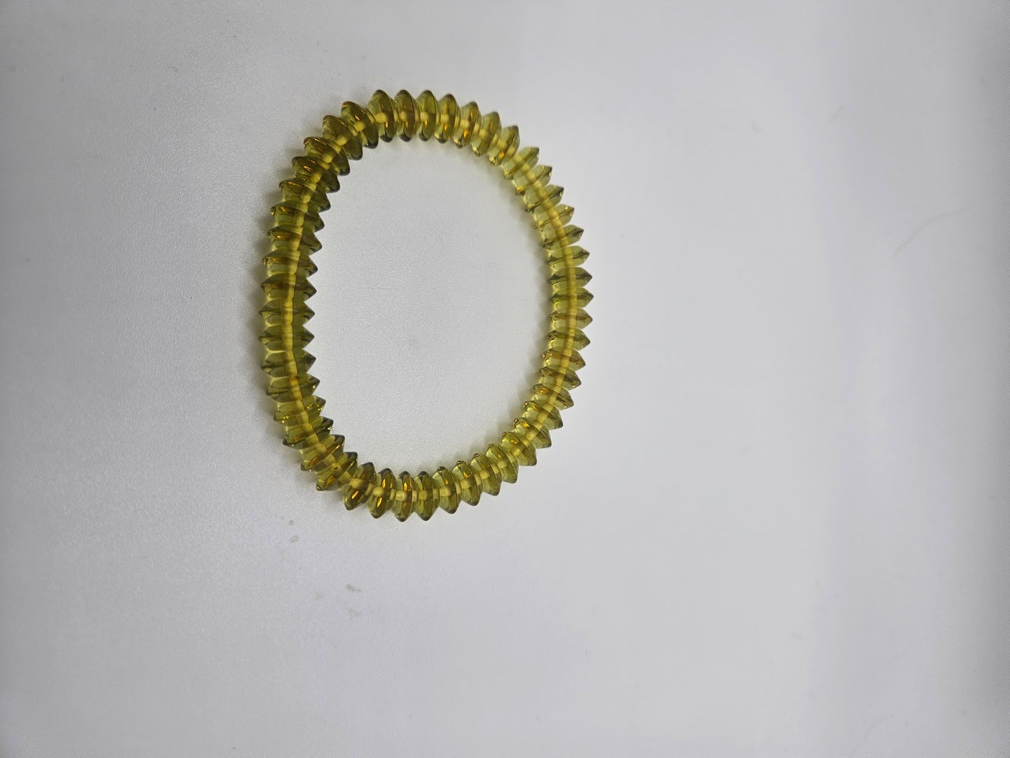 Green Saucer Amber Stretch Bracelet.