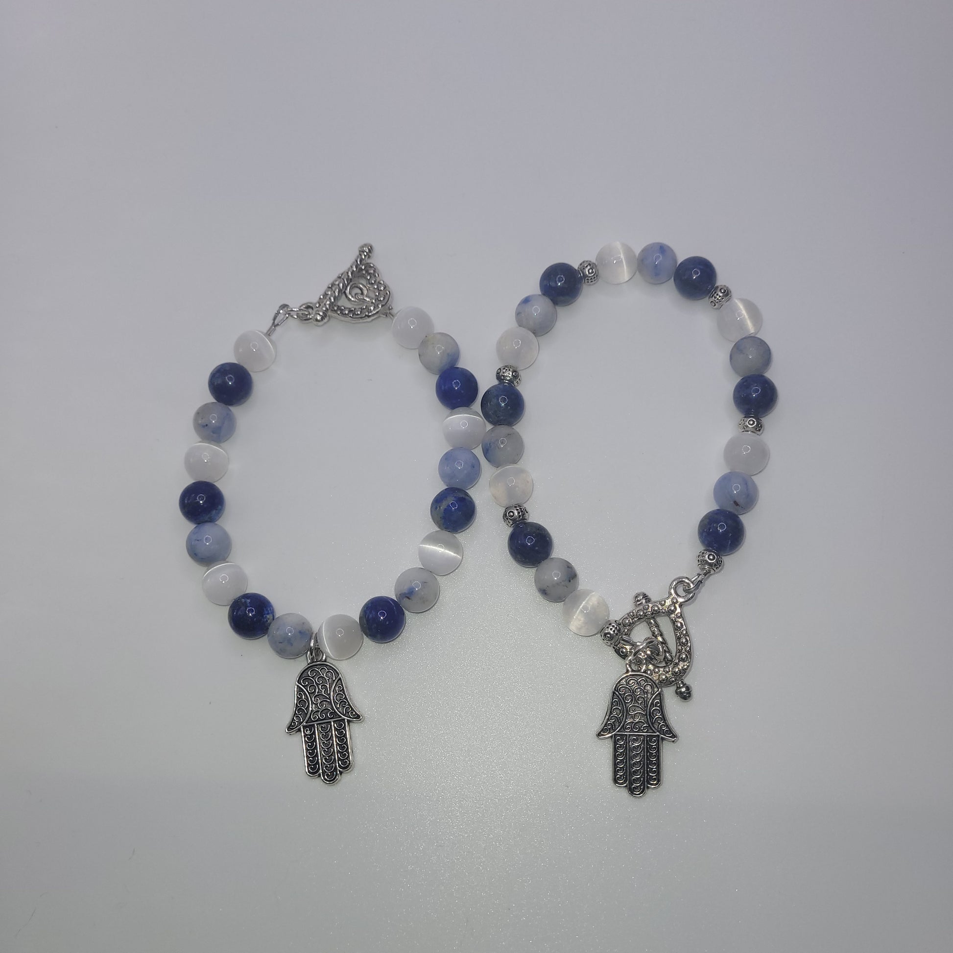 Hamsa Blue And White Gemstone Bracelet. Bracelets vary in color and design and are Chosen Randomly.