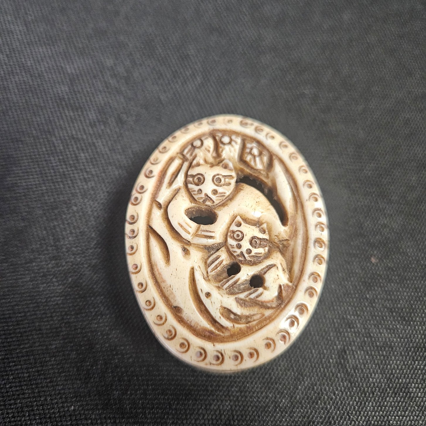 Large Cat Carved Bone Single.