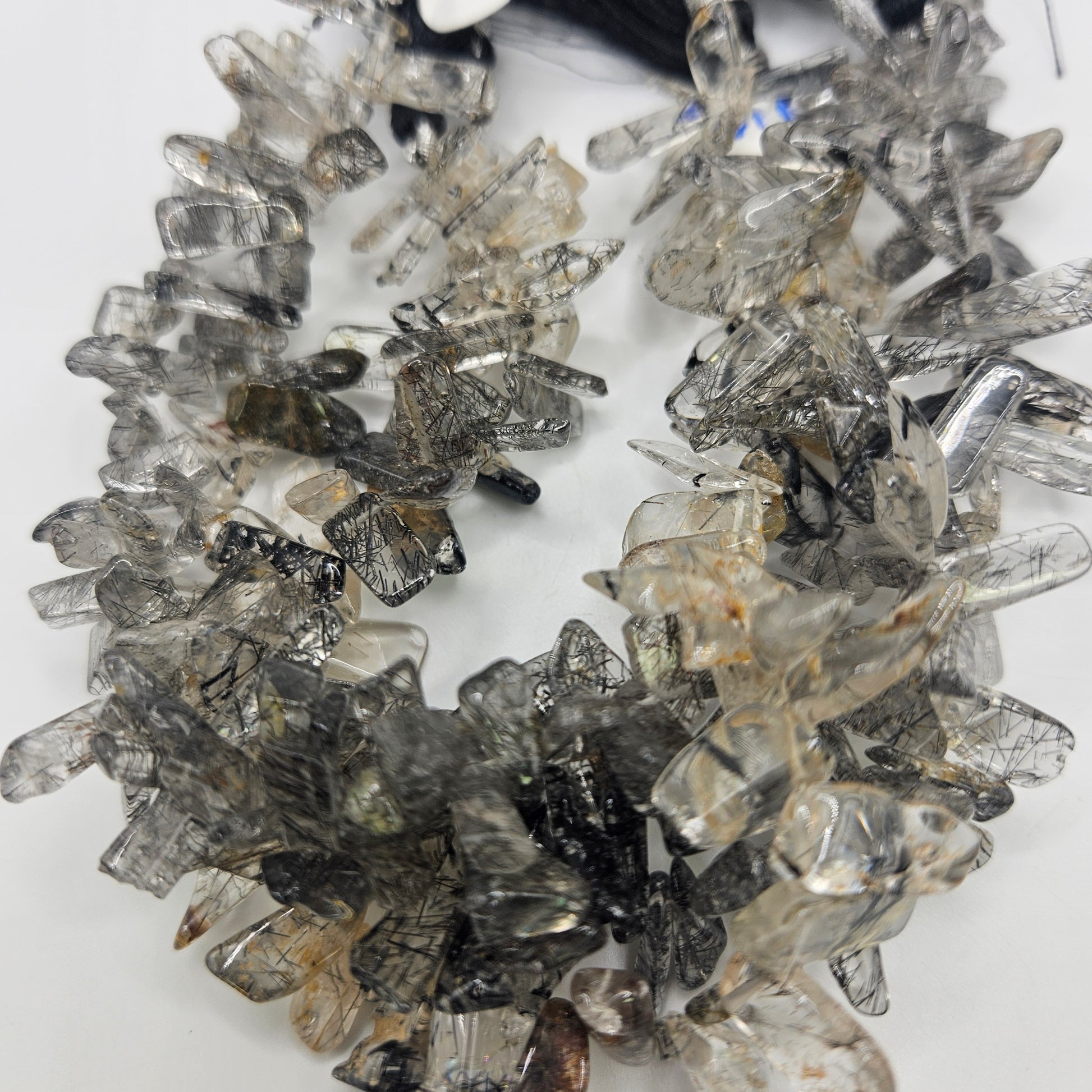large rutilated quartz chips bead strand.