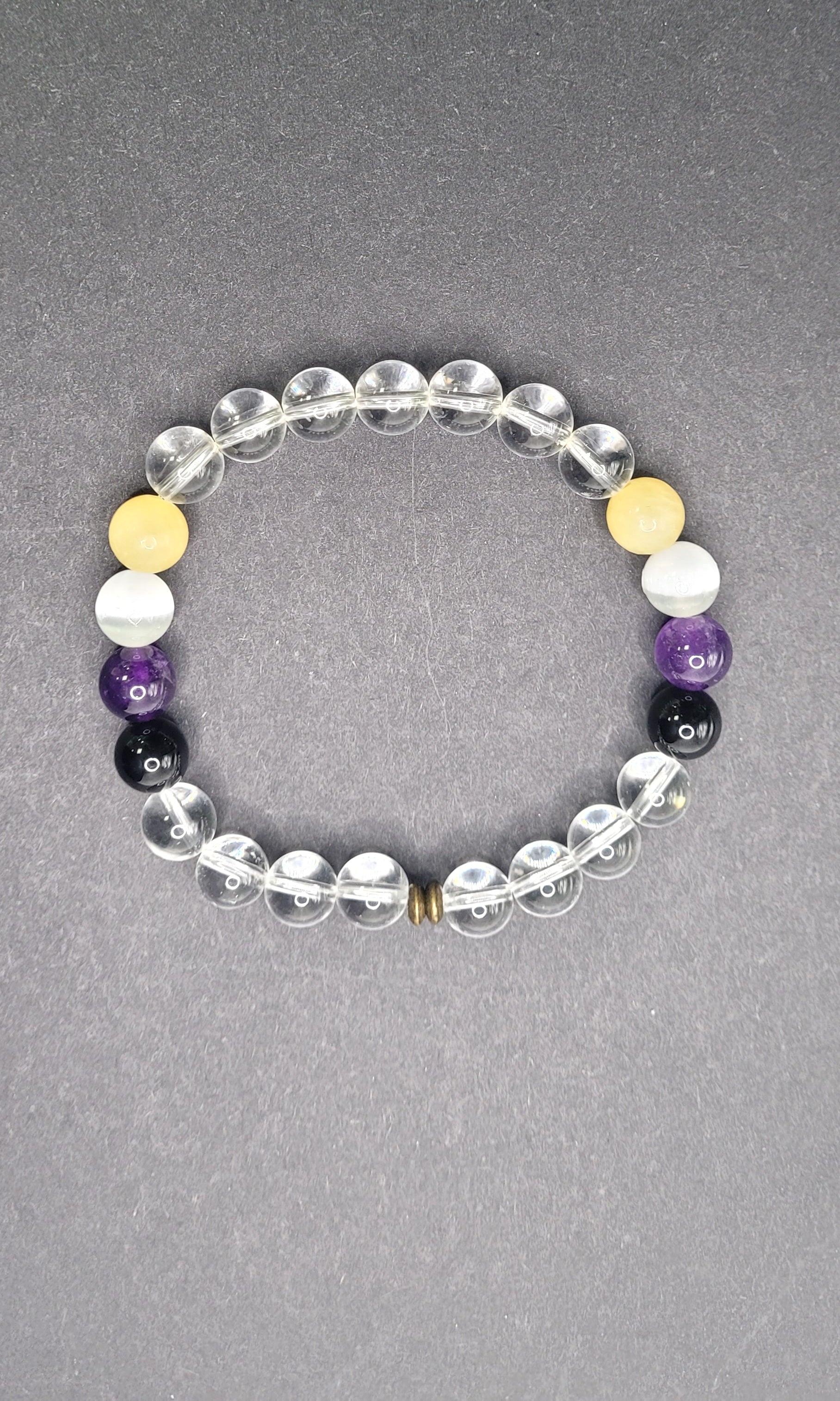 Non Binary Flag Stretch Bracelet. Pattern and design vary.