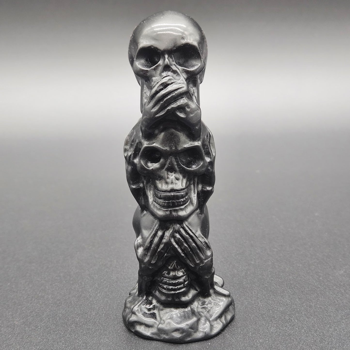 Obsidian 3 Skull Statue.