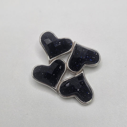 Purple Goldstone four heart pendant.