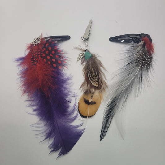 Short Feather Hair Clip. Chosen at random.Color and design vary. 