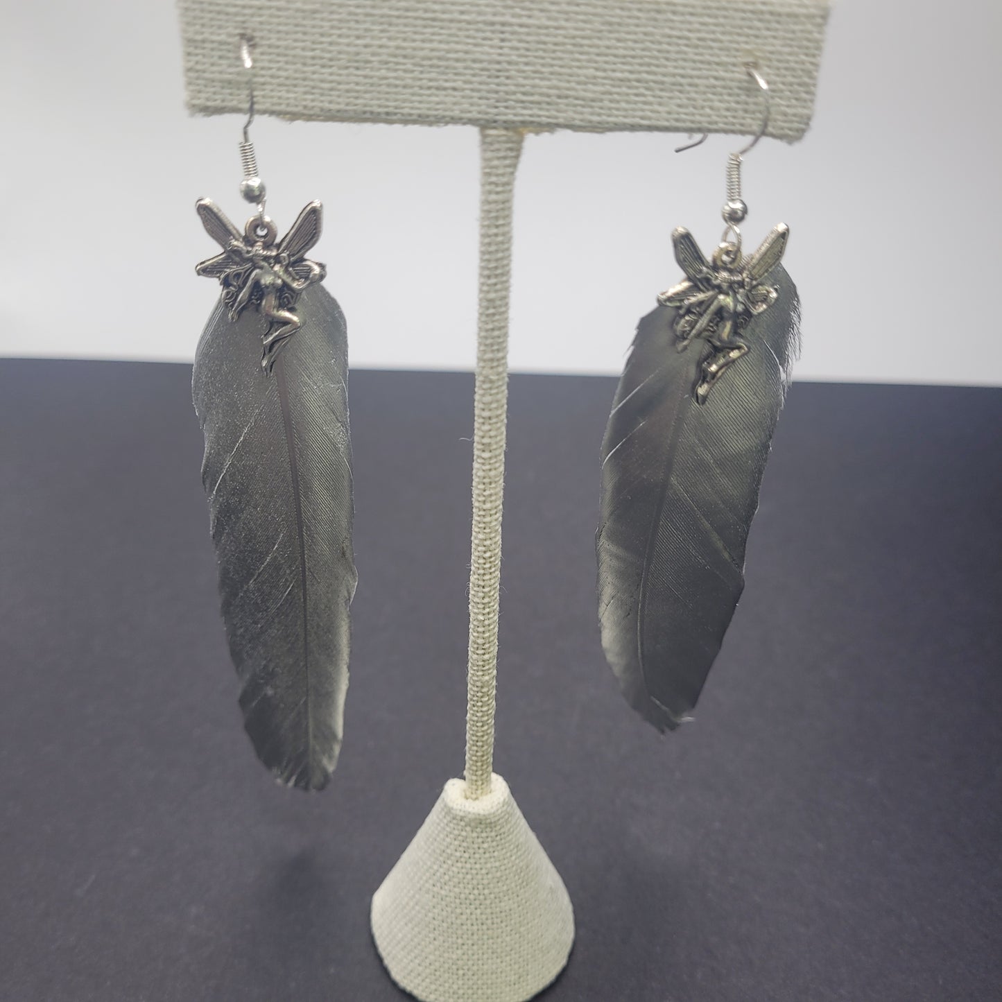 Silver Plated Silver Color Feather Fairy Earrings.