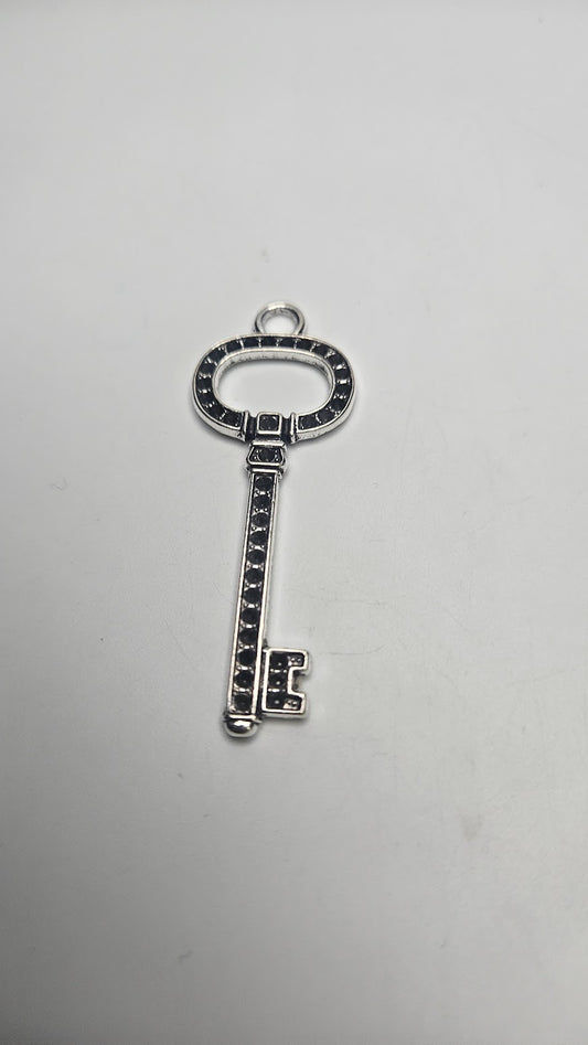 Silver Colored large key Pewter Charm.