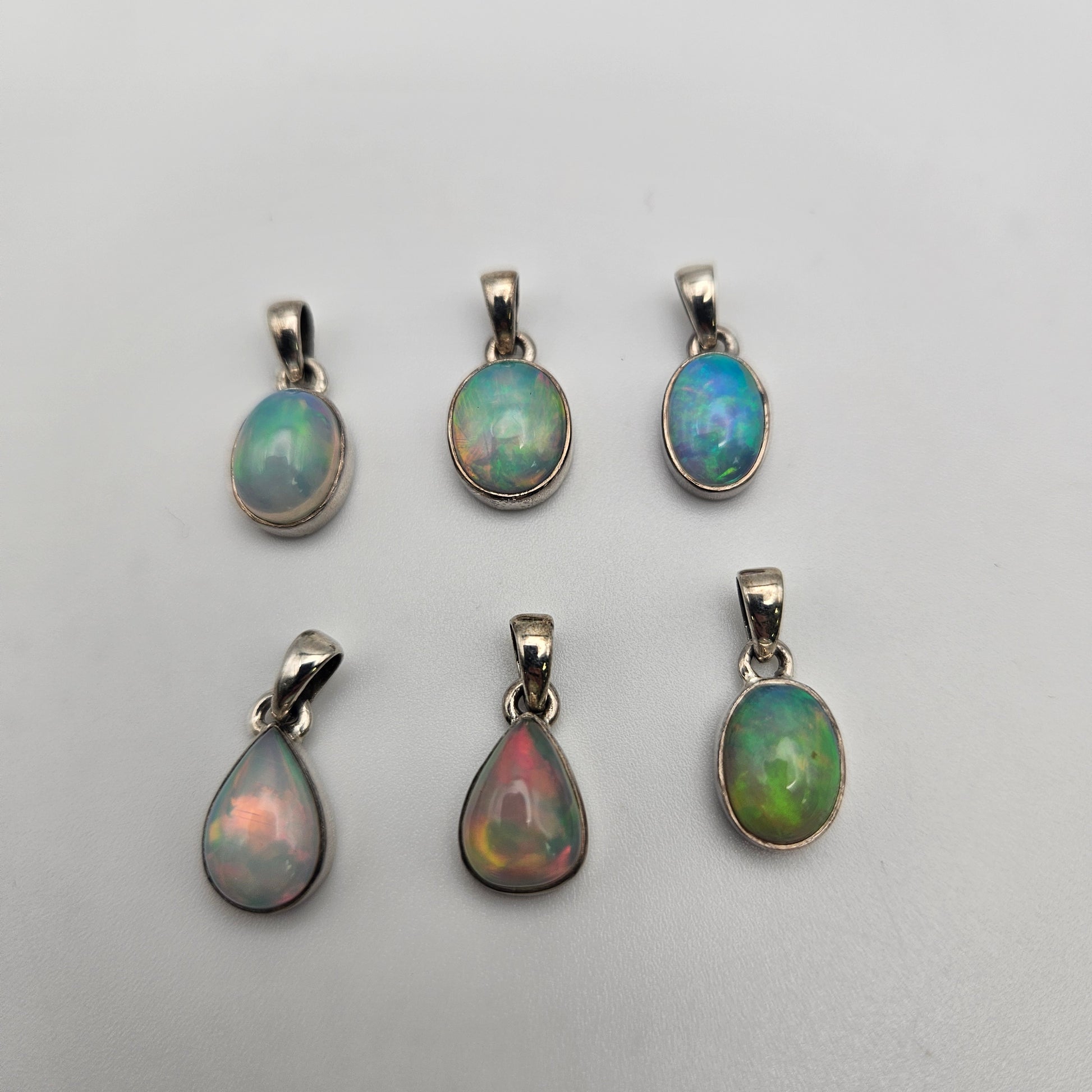 Small Sterling Silver Ethiopian Opal Bezel Pendant.