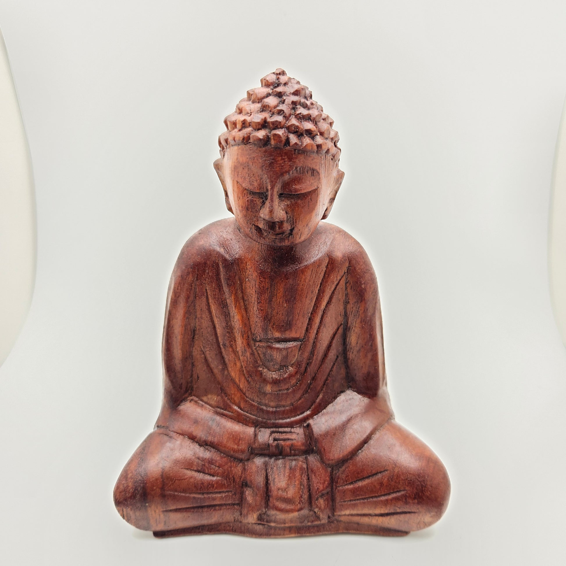 Small Wooden Buddha Statue.