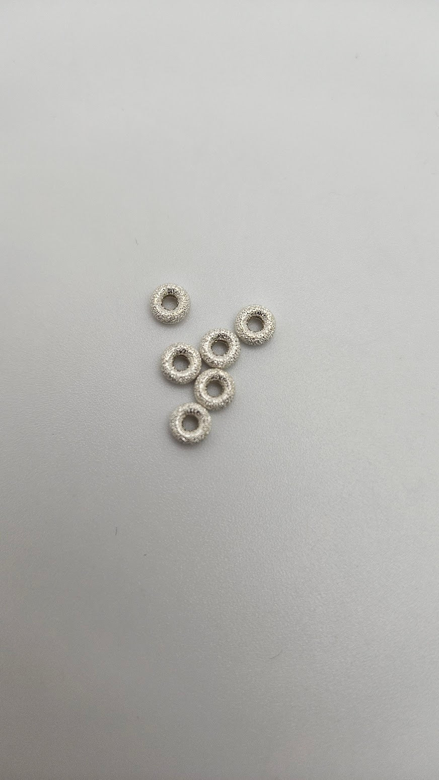 Sterling Silver 3mm Donut Single.