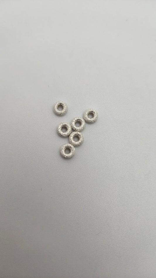 Sterling Silver 3mm Donut Single.