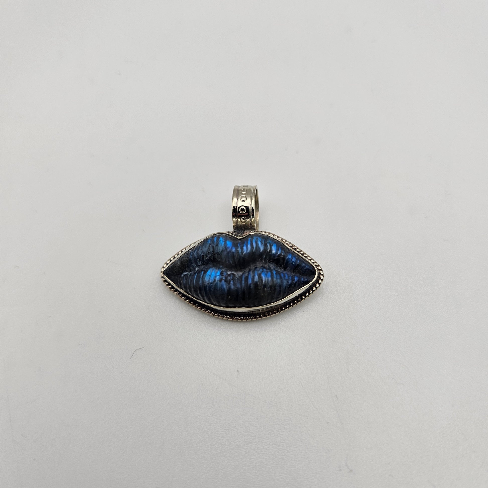 Sterling Silver Carved Labradorite Lips Pendant 1 inch.