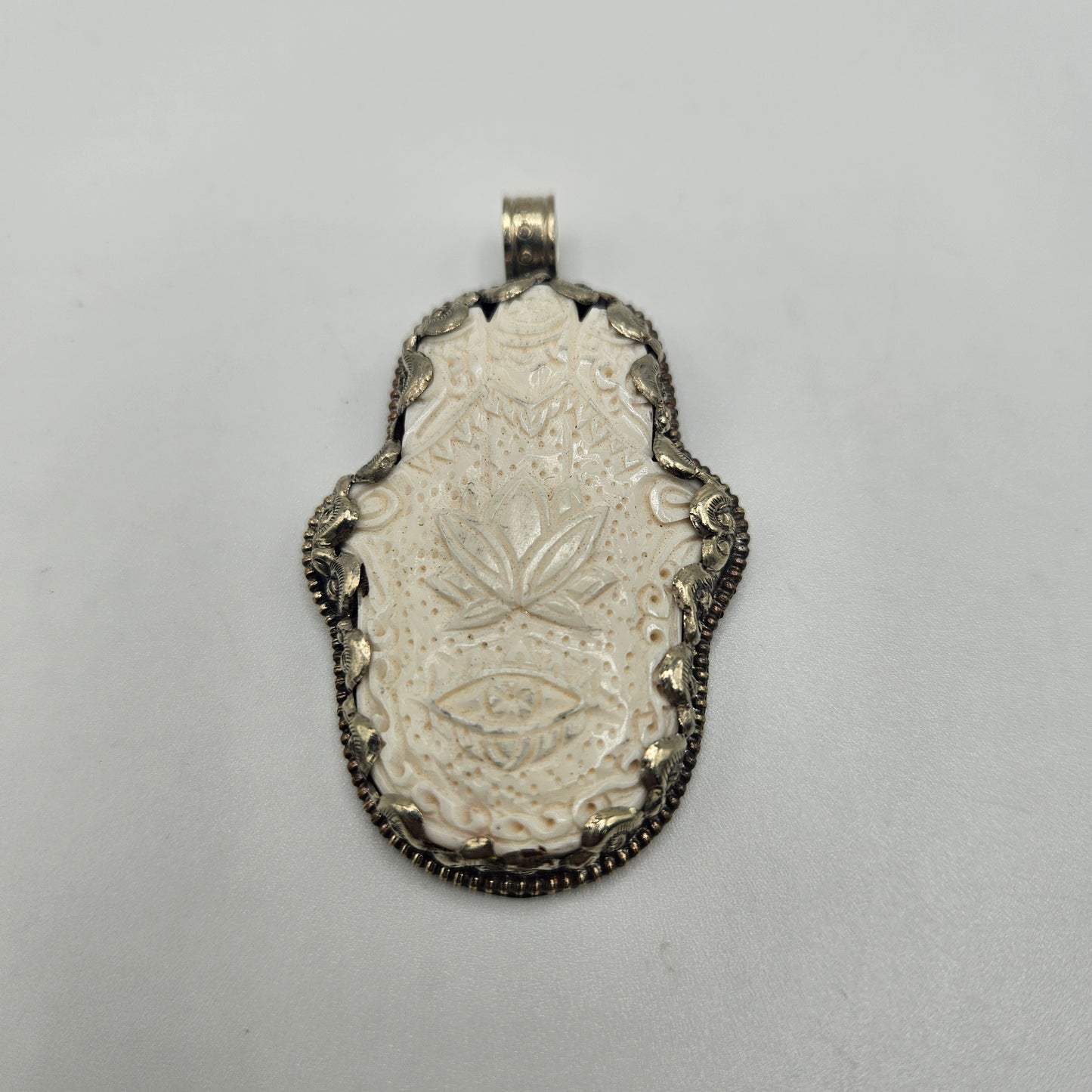 Sterling Silver Carved Ox Bone Hamsa Pendant.