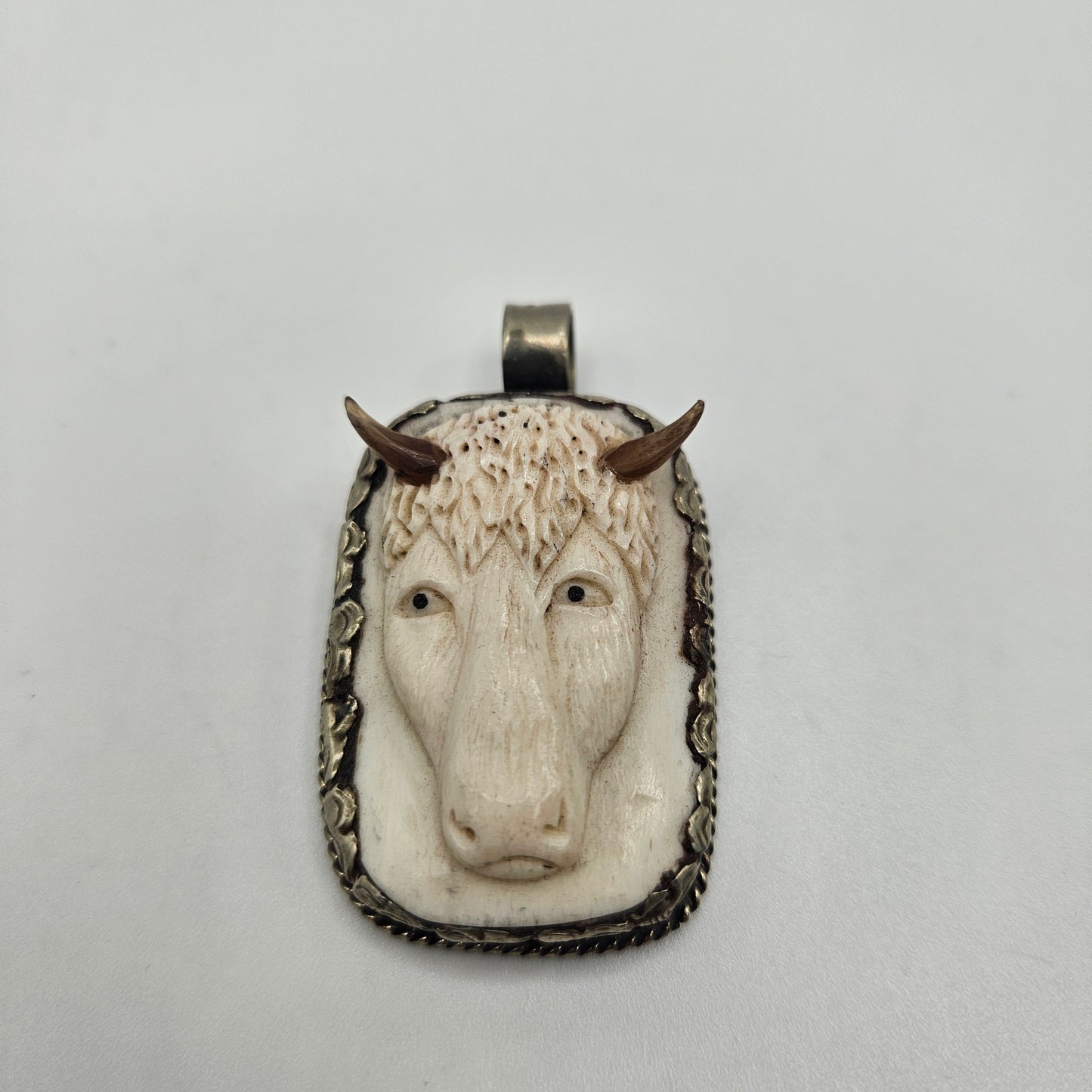 Sterling Silver Carved Ox Pendant.