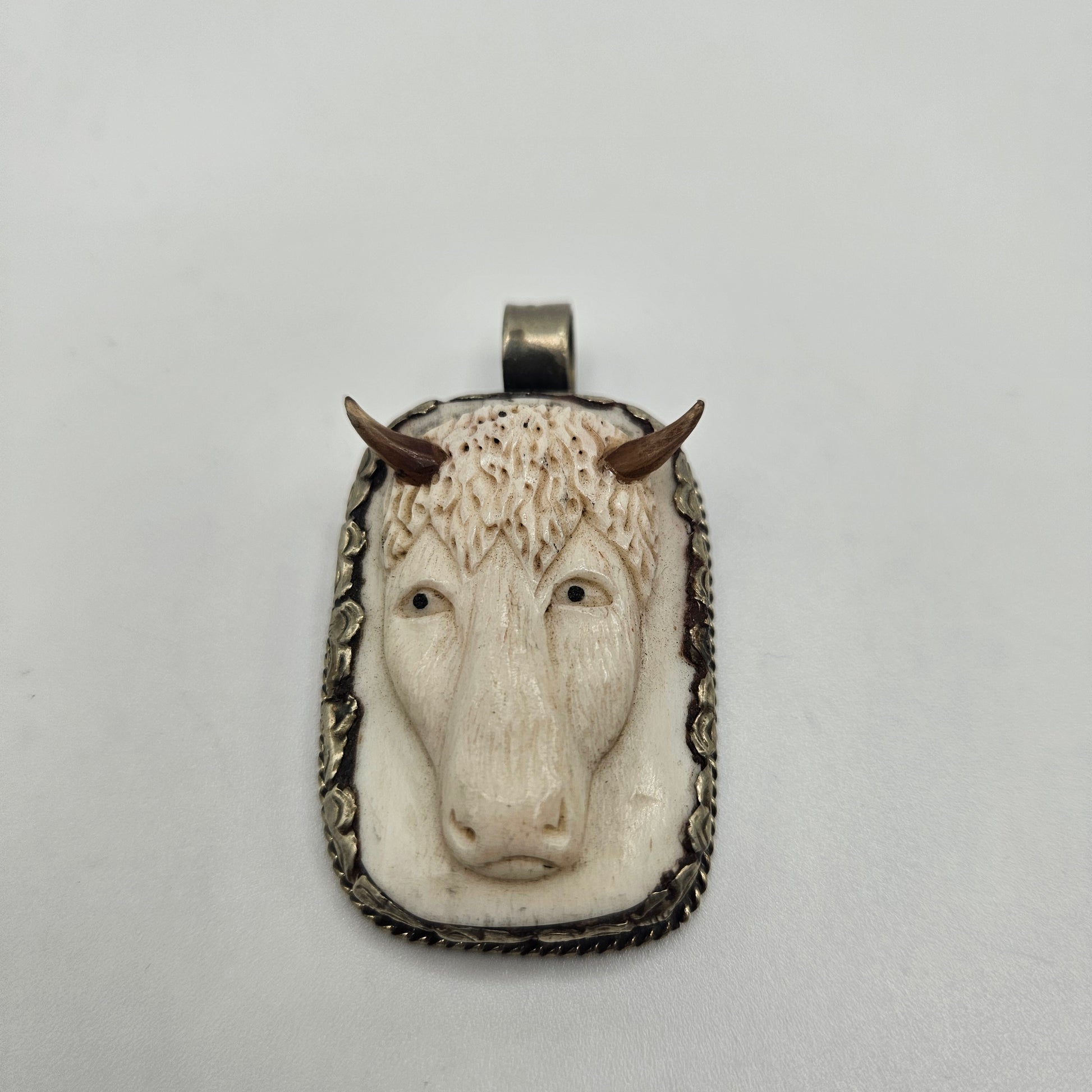 Sterling Silver Carved Ox Pendant.
