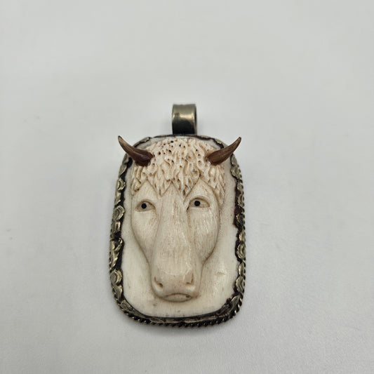 Sterling Silver Carved Ox Pendant.