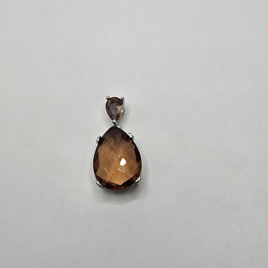 Sterling Silver Color Change Two Stone Teardrop Pendant.