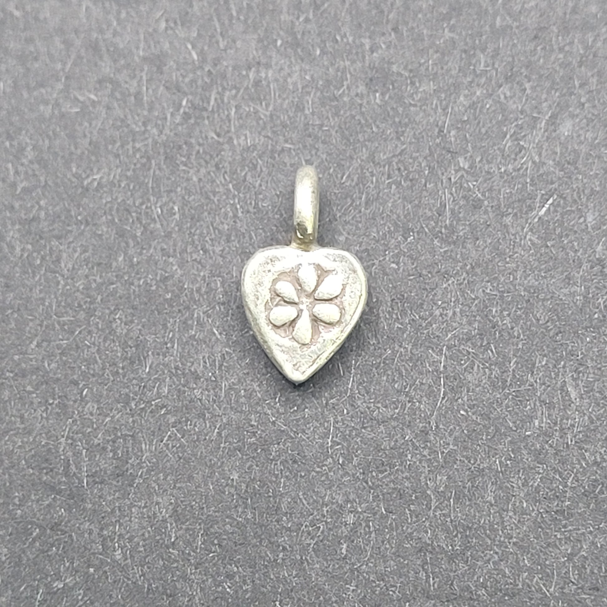 Sterling Silver Dainty Flower Charm.
