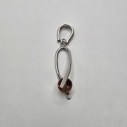 Sterling Silver Faceted Color Change Gemstone Twisted Pendant.