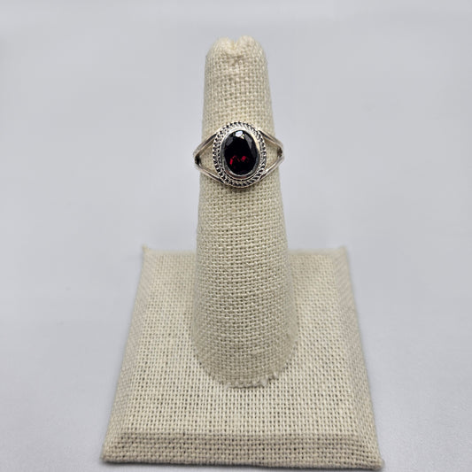 Sterling Silver Faceted Oval Garnet Ring Size 5.