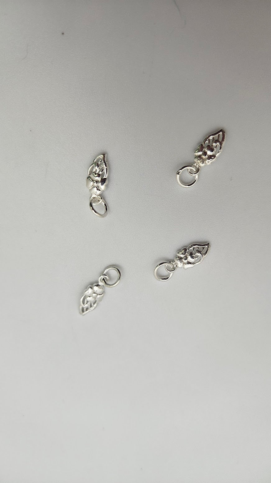 Sterling Silver Floral Charm Single.